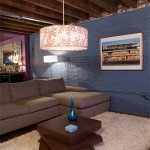 Basement with painted blue walls and laminate floor