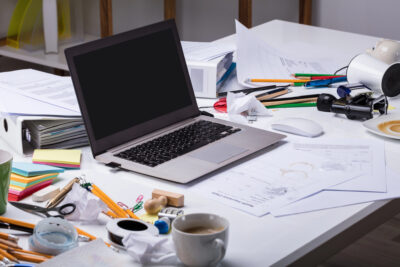 digital clutter, such as a flooded inbox, can be as distractive and annoying as regular clutter