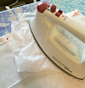 ironing a hem with stitch witchery