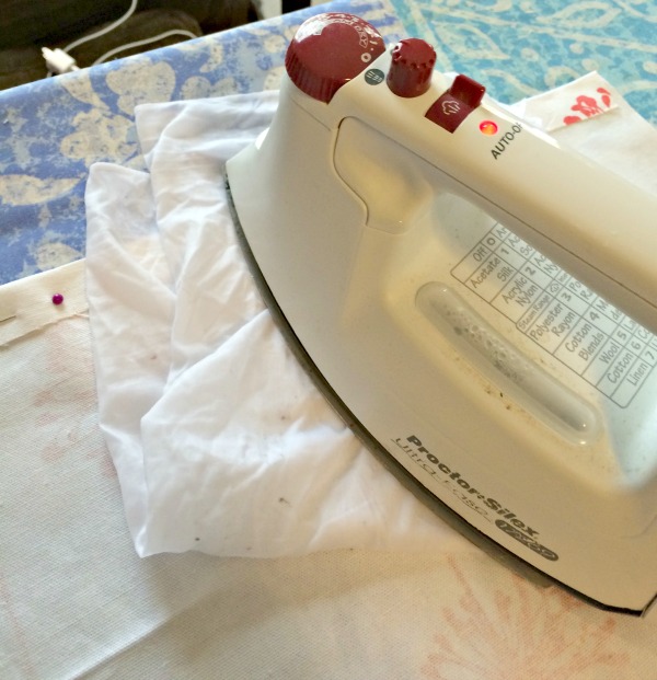 ironing a hem with stitch witchery
