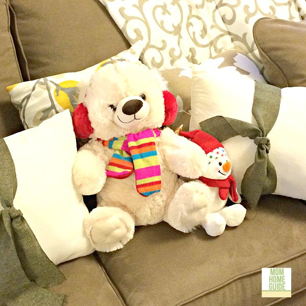 winter teddy bear on sofa