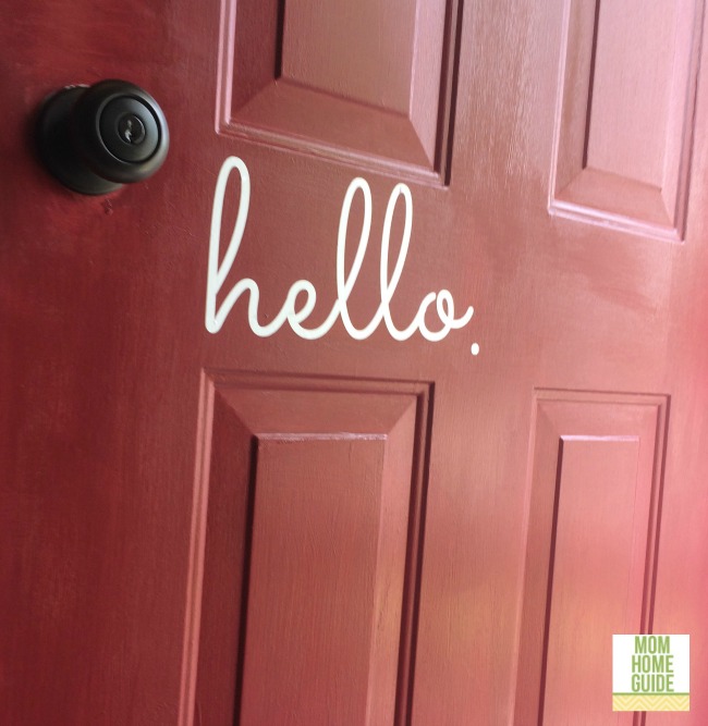 A red front door with Modern Masters Door Paint and a hello door decal by The Vinyl Company