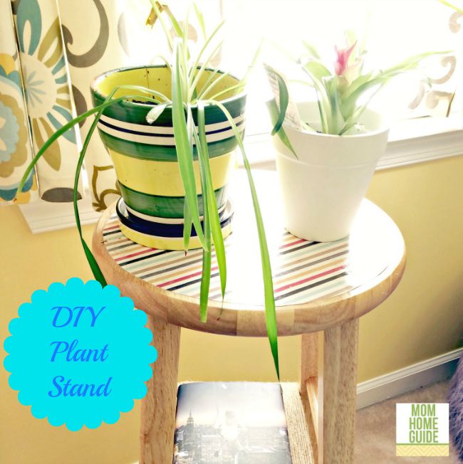 DIY Plant Stand from a bar stool and decorated with scrapbook paper