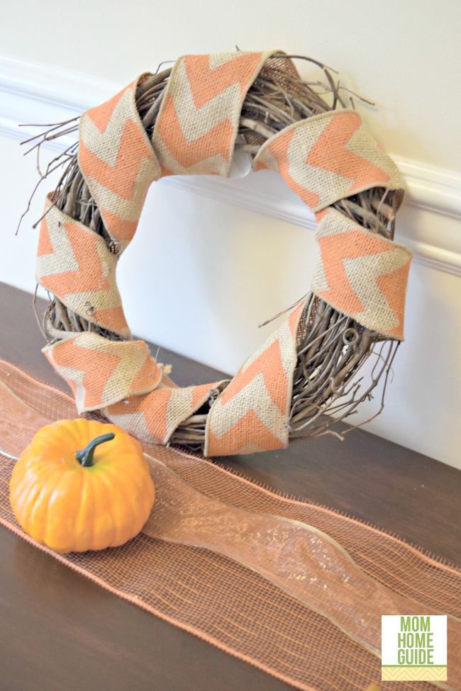 Grapevine wreath wrapped with a chevron burlap wreath