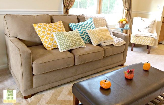 I like to keep my home's living room light, bright and colorful for the fall to combat the shorter days!