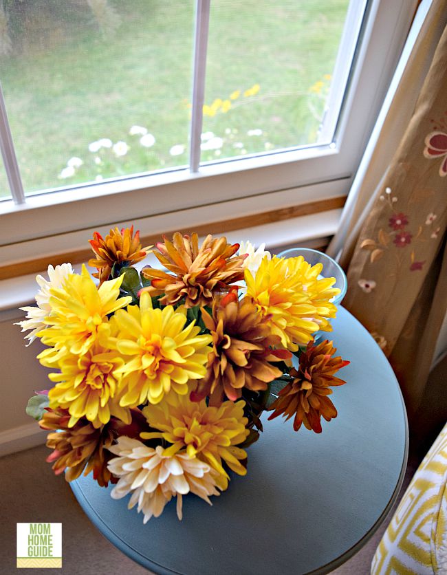 Inside I have a faux flower fall arrangement, while you can see my autumn flowers blooming outside!