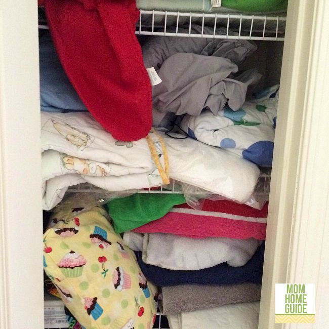 messy and disorganized linen closet