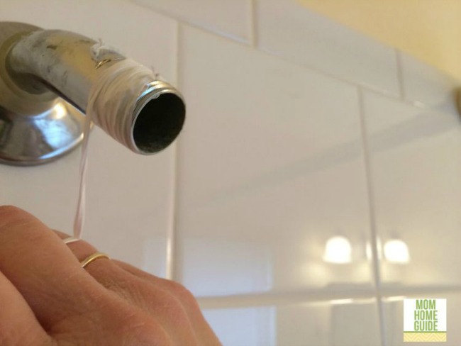 Wrap teflon tape on the shower pipe before installing a new shower head