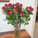 I love the way this vase of red roses looks on my DIY chalk painted and stained console table!