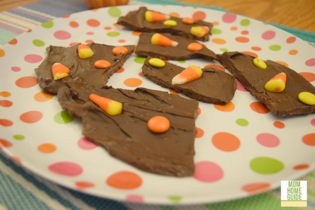 This homemade dark chocolate Halloween candy corn bark with candy corn and Reese's Pieces is simple to make!