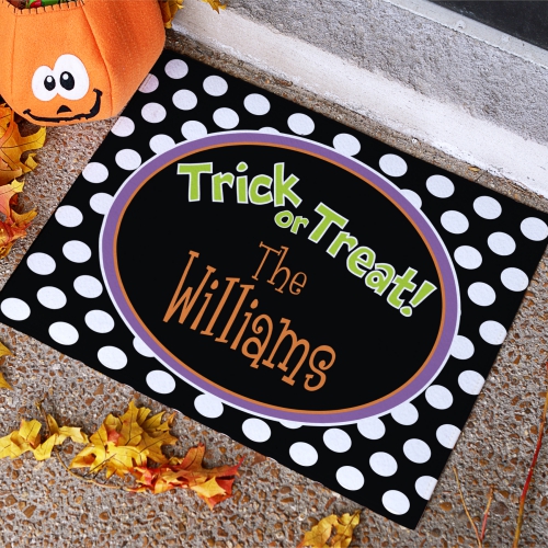 I love this super cute personalized Halloween door mat!