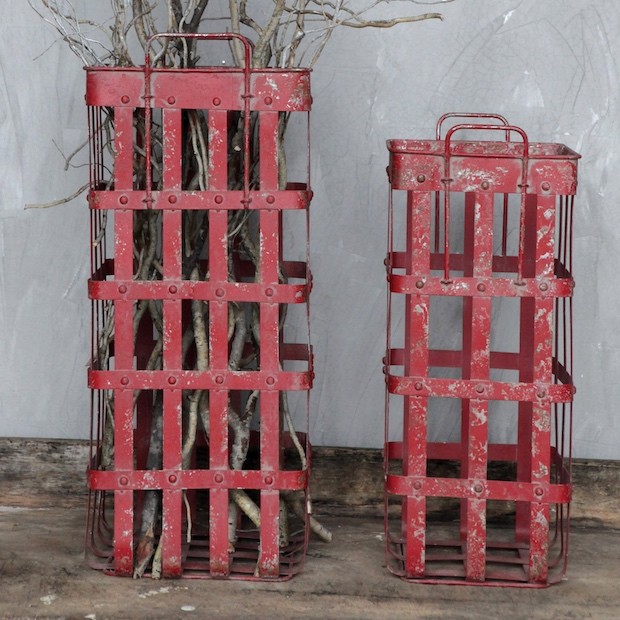 These tall red metal baskets would look great in front of my home's fireplace, filled with faux or dried fall flowers.