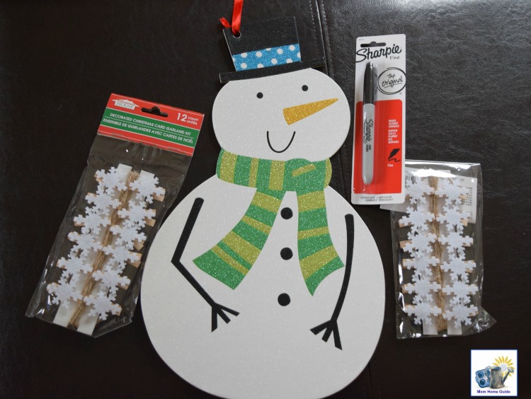Supplies needed to make a lottery holiday countdown snowman