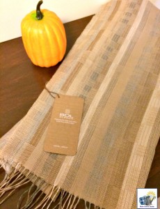 A silky Sol Alpaca scarf also makes a great table runner