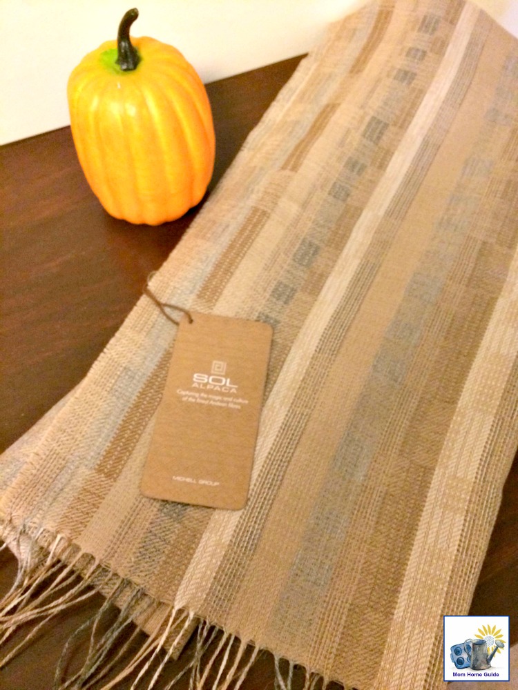 A silky Sol Alpaca scarf also makes a great table runner