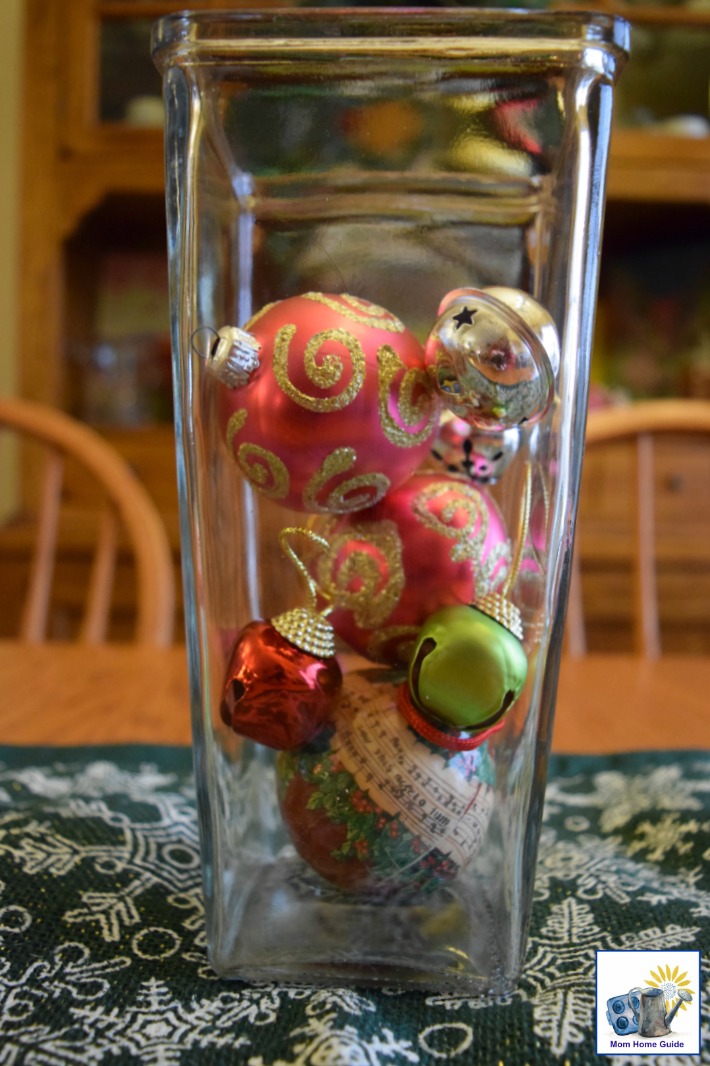 Vase filled with Christmas ornaments