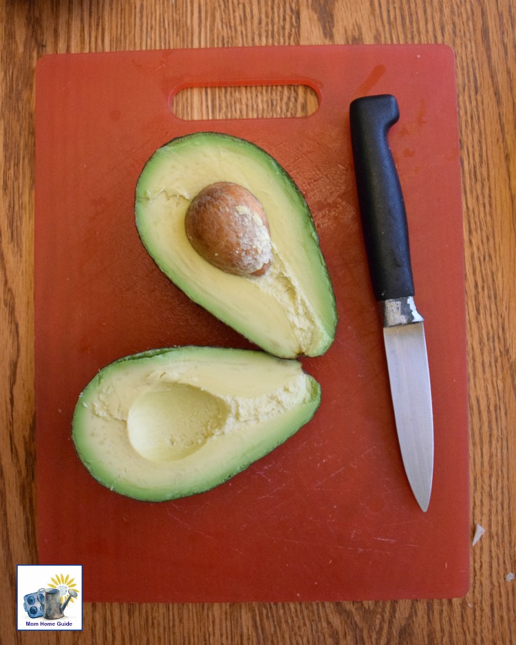 It's rather easy to cut open an avocado and scoop out the pit.