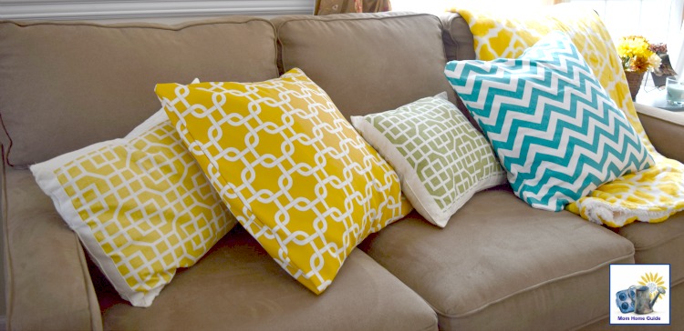 DIY pillows on brown living room sofa