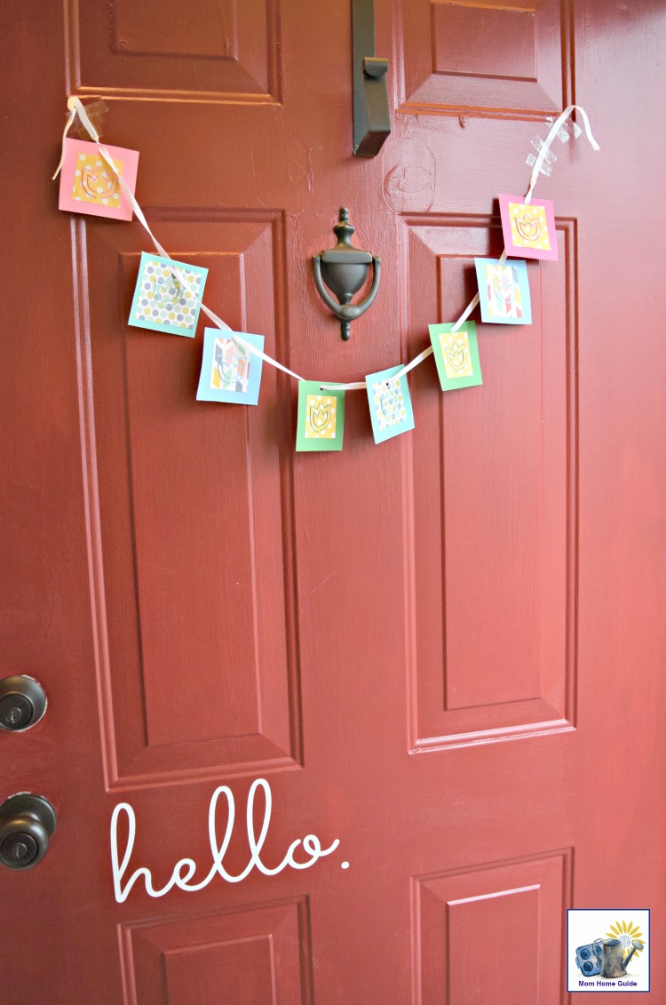 tulip scrapbook paper banner on a red front door