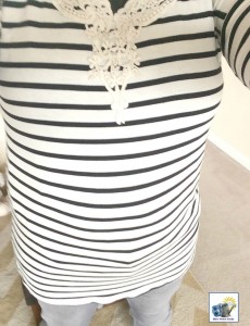 A black and white striped top with a pretty crochet neckline