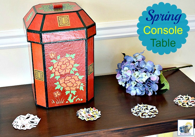 spring console table decorated with scrapbook paper punches