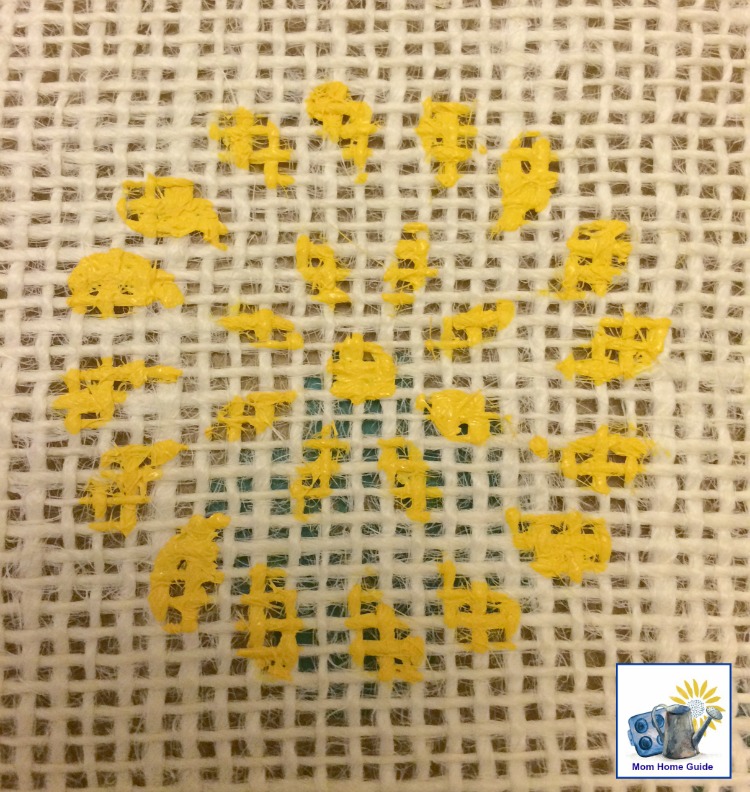 yellow stencil on burlap