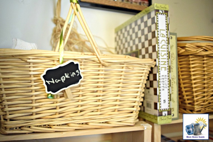 Baskets provide extra storage in a coat closet turned pantry
