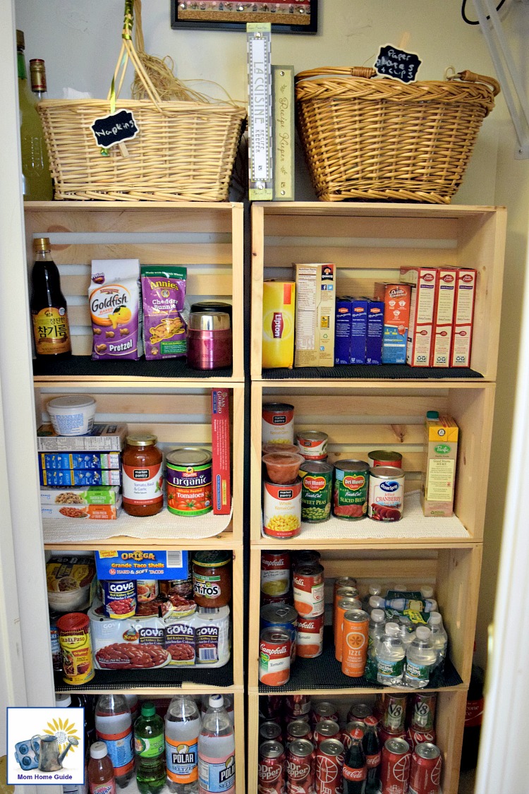 An organized coat closet turned pantry