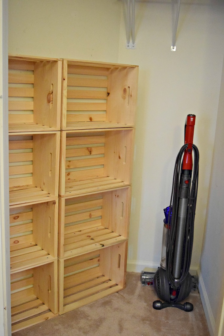 Wood crates make great storage in a clost