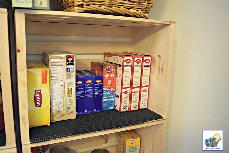 Crate pantry shelves lined with shelf liner