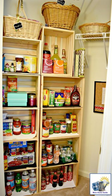 Easily convert a coat closet into a cute pantry by screwing some inexpensive wooden crates together
