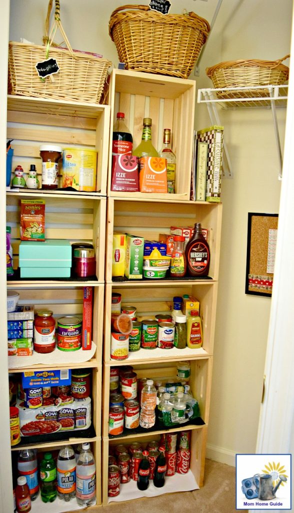 Easily convert a coat closet into a cute pantry by screwing some inexpensive wooden crates together