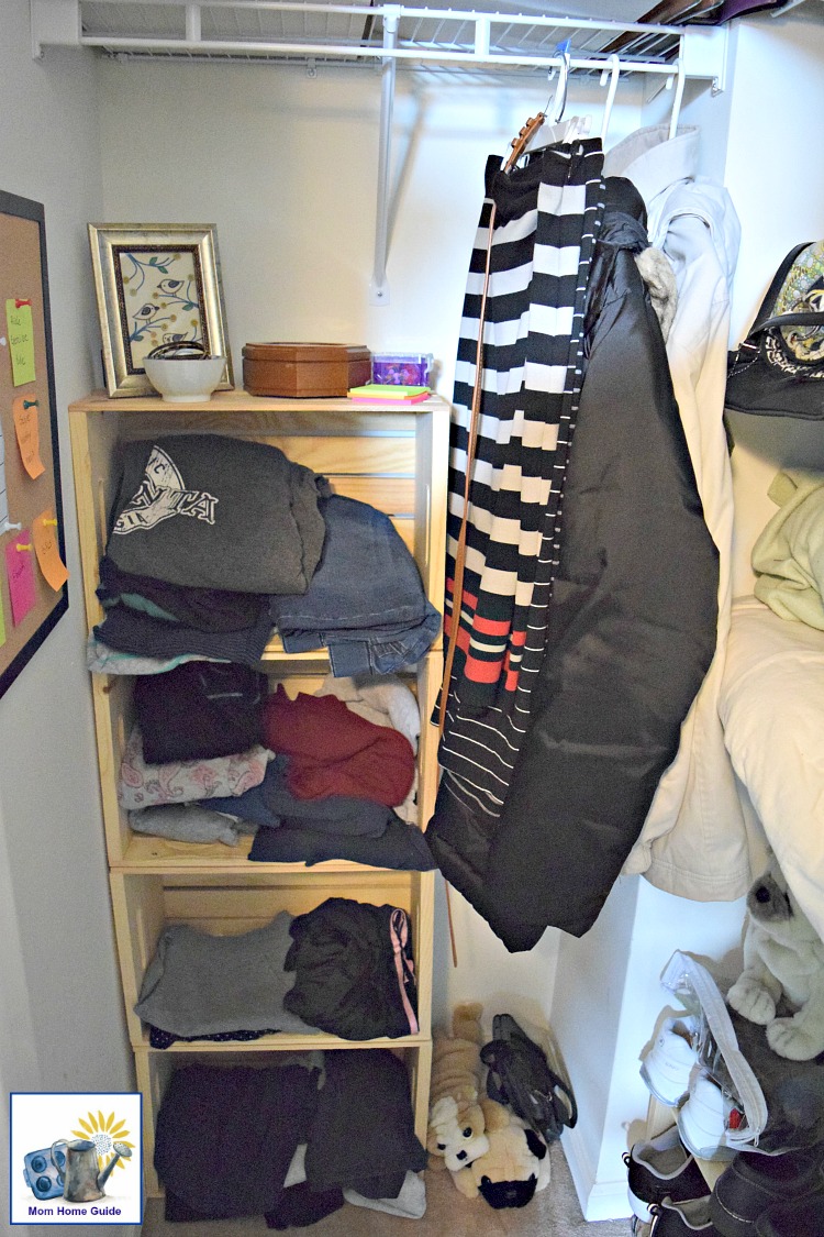 My newly organized closet with its DIY crate shelving