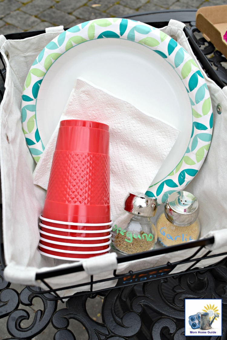 Patio caddie for paper plates, cups and napkins -- plus pizza seasonings!