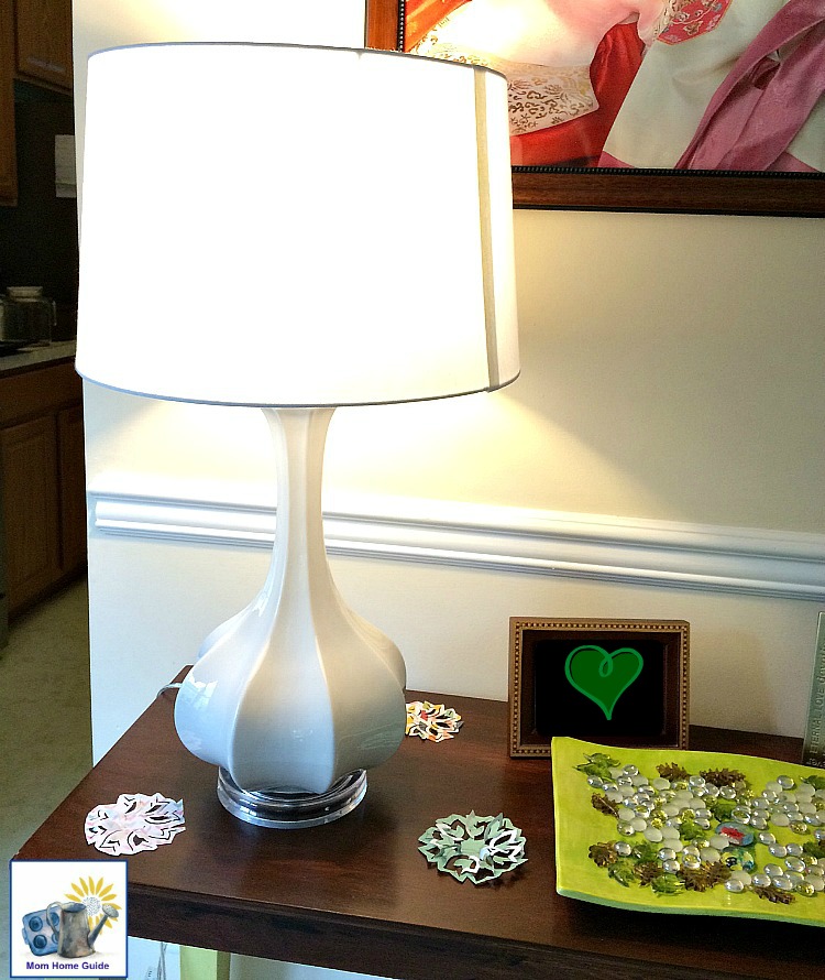 white gourd lamp on chalk painted console table in living room