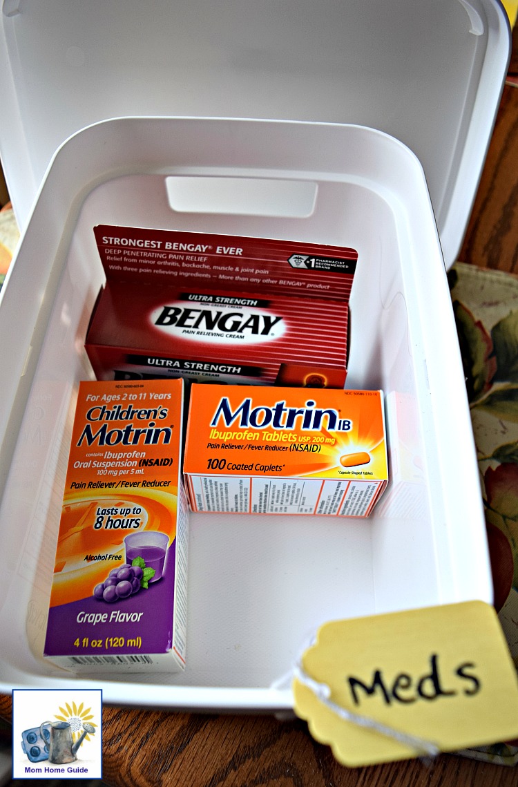 Organize medicine in a simple dollar store plastic cubby and store in your pantry