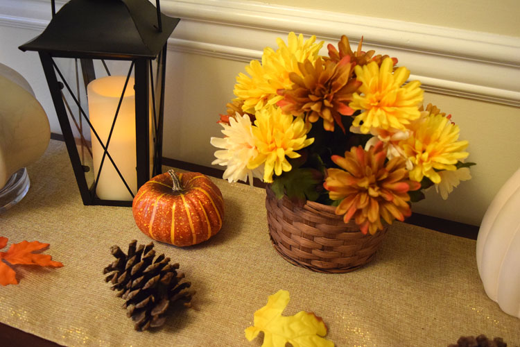 Fall console table with black metal lantern from Oriental Trading