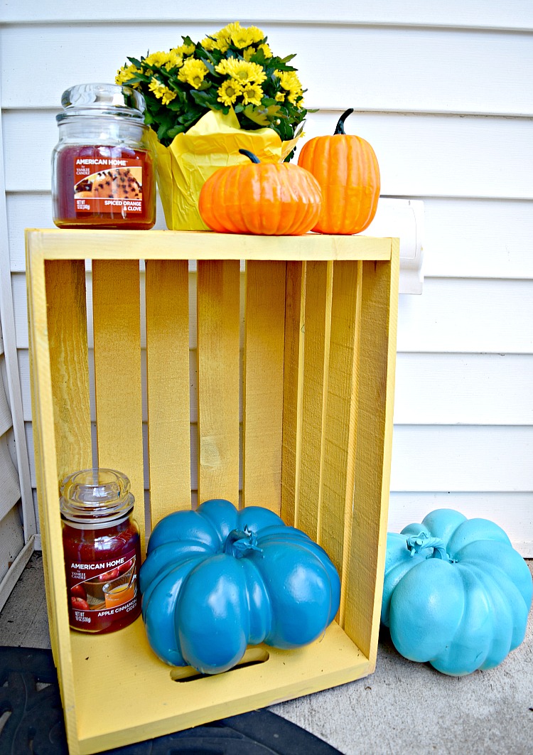 I love this slightly unconventional fall front porch decor with the blue pumpkins!