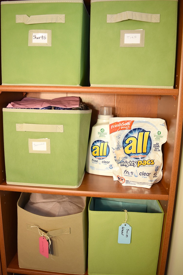 Clothing can easily be stored or hidden in a bookcase through the use of cloth bins
