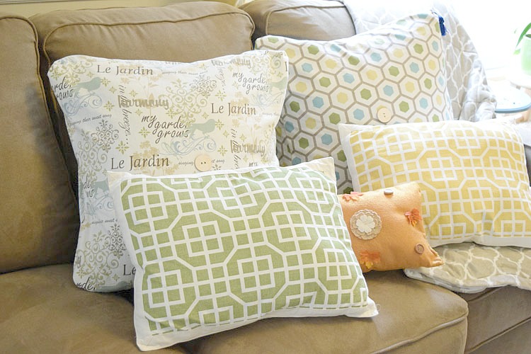 Pretty pillows on a sofa decorated for fall