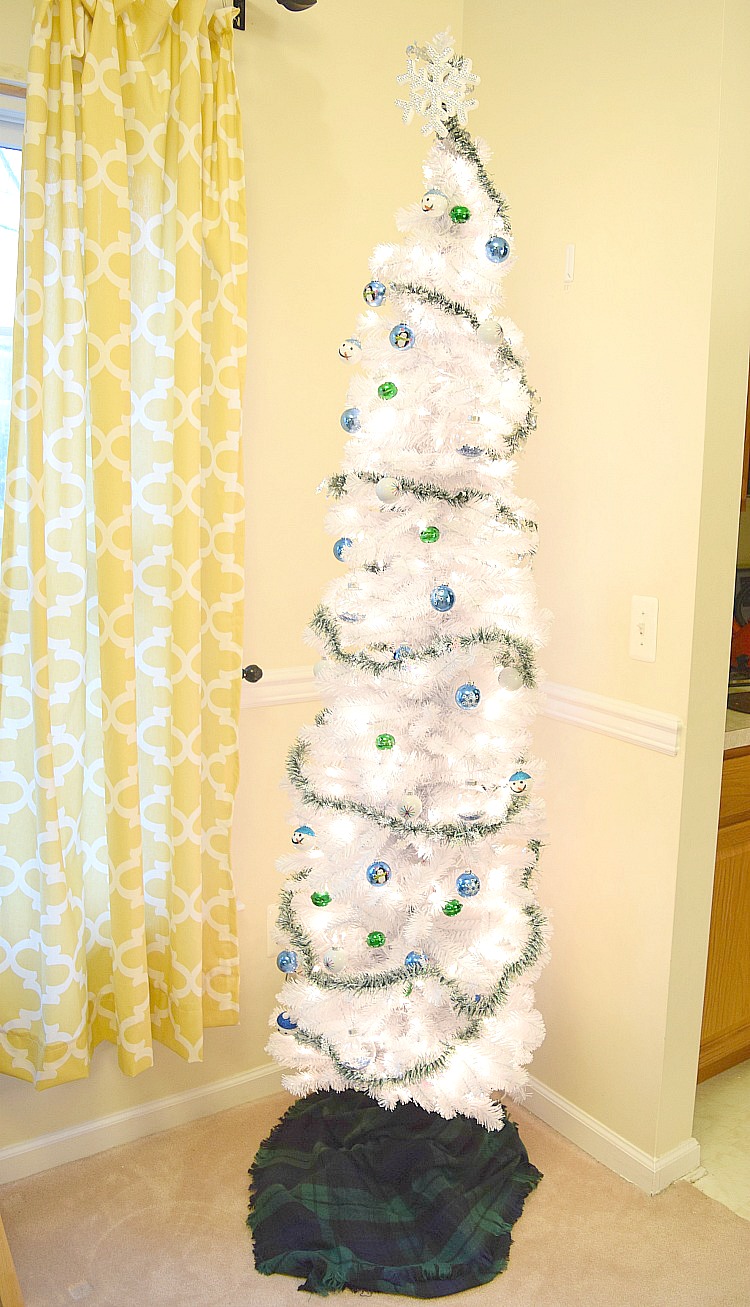 Tall thin white Christmas tree