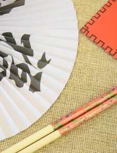 Chinese fans, red envelope and chopsticks from Oriental Trading