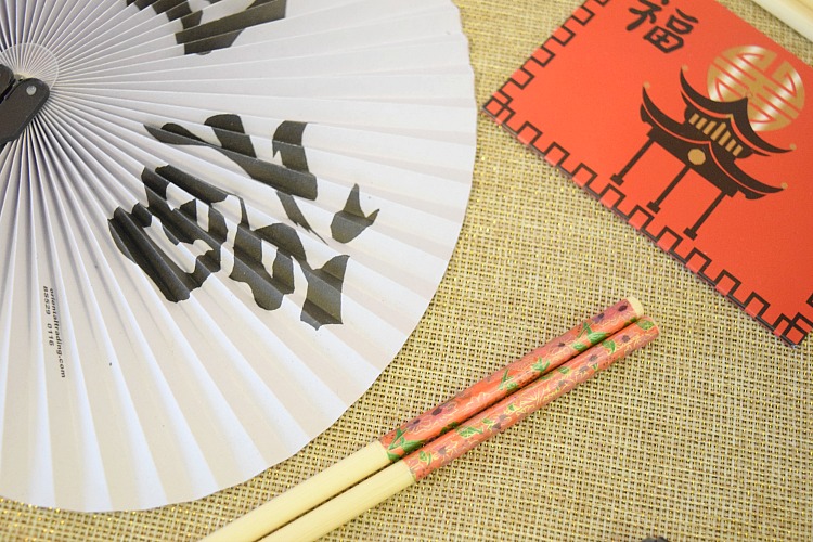Chinese fans, red envelope and chopsticks from Oriental Trading