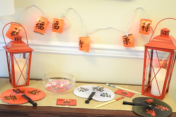 console table decorated with red lanterns from Oriental Trading for the Chinese New Year