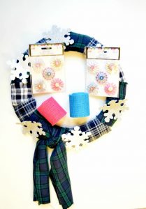 Materials for a pink and blue burlap wreath with multi-color pinwheels