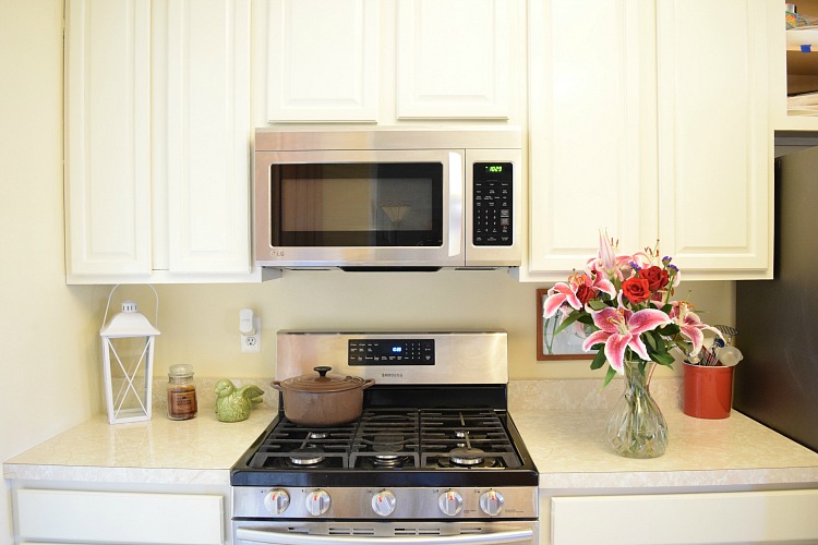 oak kitchen cabinets painted white with General Finishes Antique White milk paint