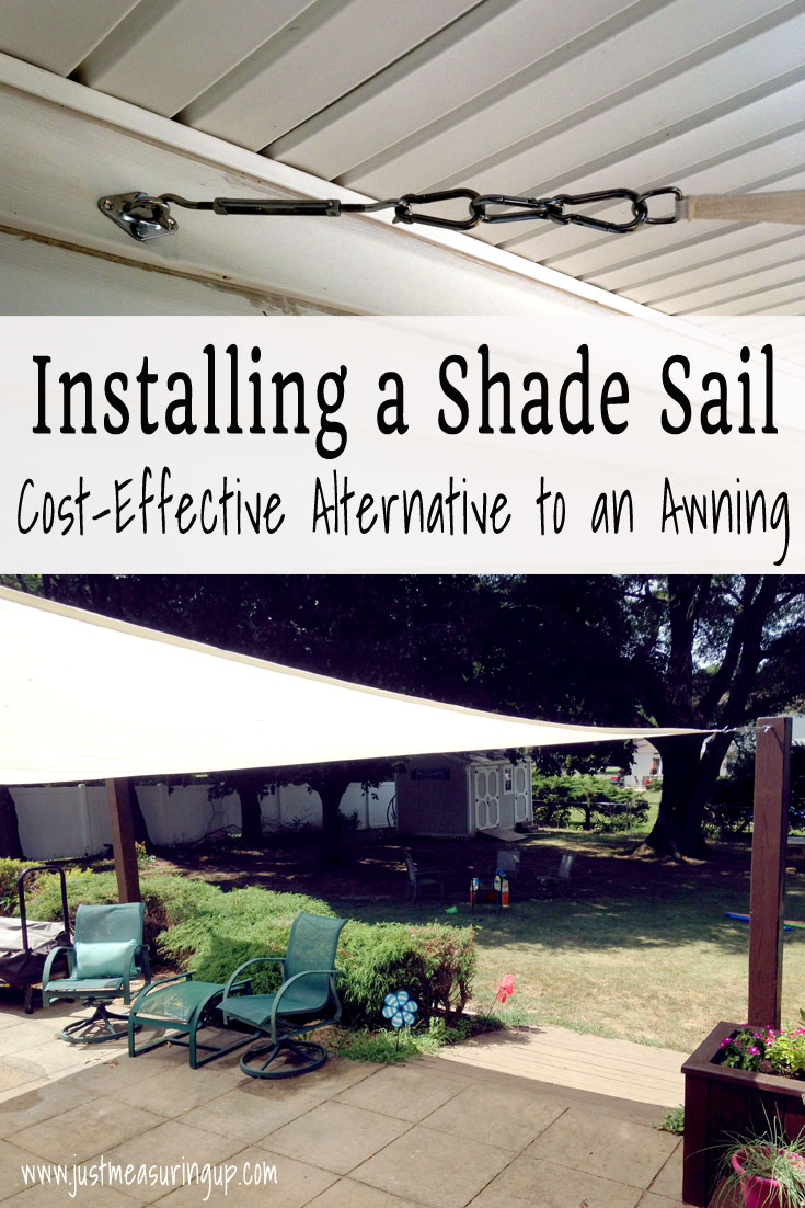 installing a shade sail on the patio