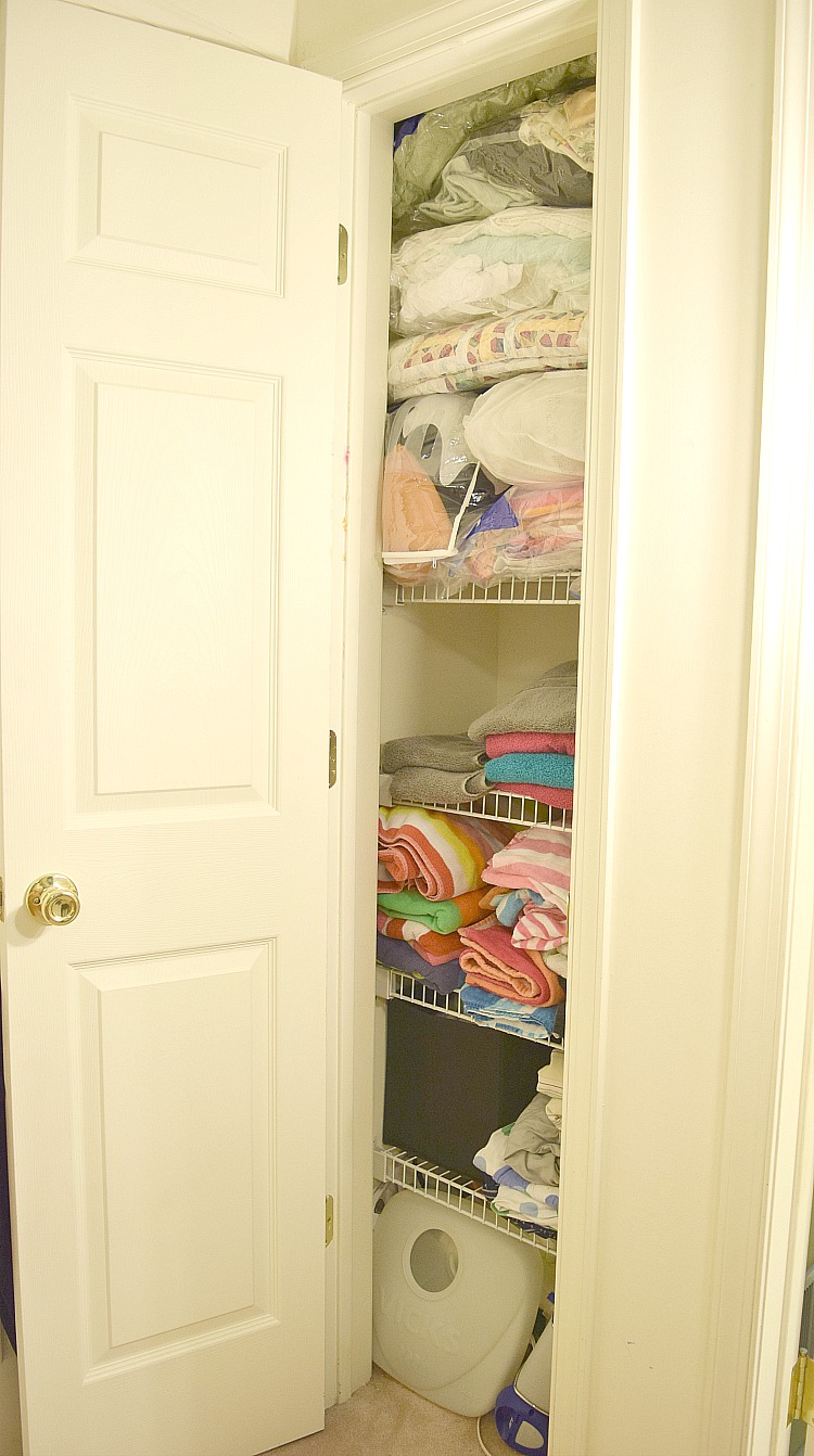 https://momhomeguide.com/wp-content/uploads/2017/06/after-photo-linen-closet-organized-mom-home-guide.jpg