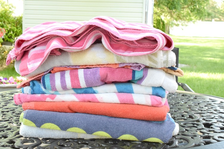 Stack of colorful beach towels