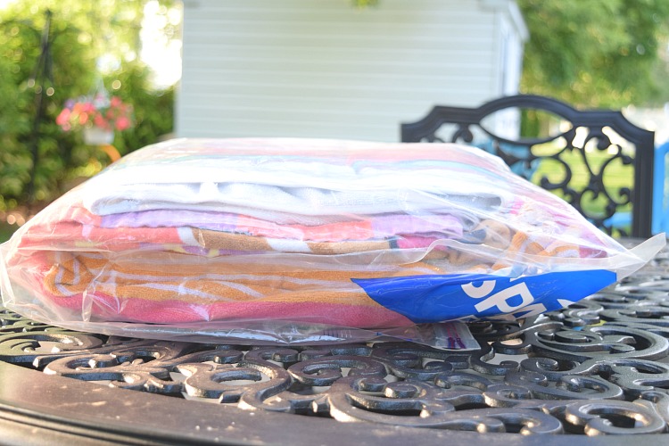 Storing beach towels in Ziploc storage bags